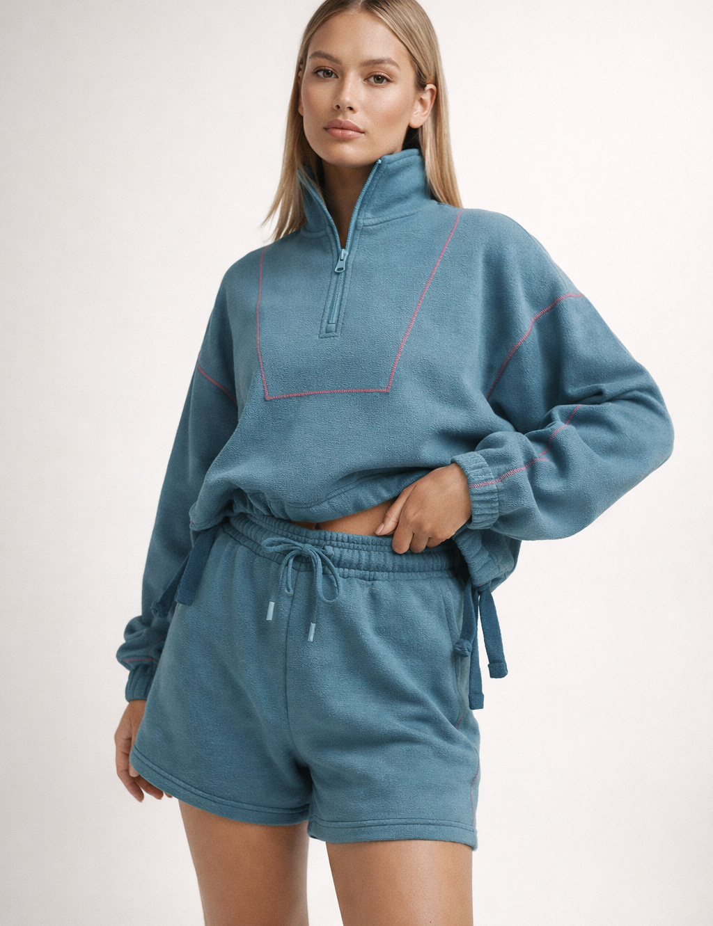 Teal half-zip sweatshirt and shorts set with contrast stitching