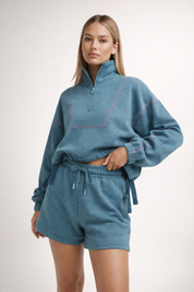 Teal half-zip sweatshirt and shorts set with contrast stitching