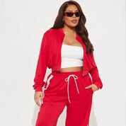 Red cropped zip jacket and wide-leg pants set with side stripe