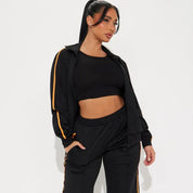 Black zip-up jacket and wide-leg pants set with stripe detail