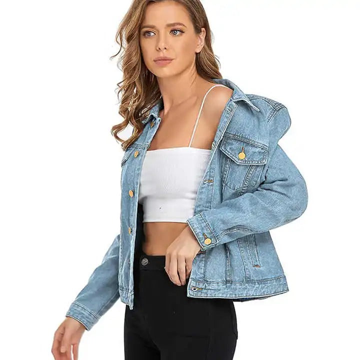 Light blue denim jacket with button front and flap pockets