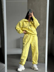 Yellow zip-up sweatshirt and jogger set with contrast seams