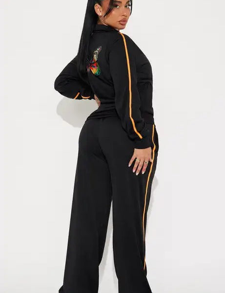 Black zip-up jacket and wide-leg pants set with stripe detail