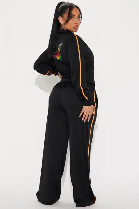 Black zip-up jacket and wide-leg pants set with stripe detail
