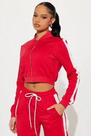 Red cropped zip jacket and wide-leg pants set with side stripe