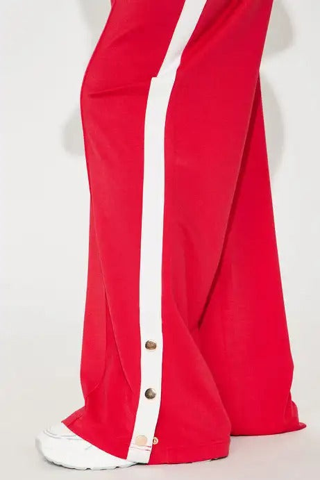 Red cropped zip jacket and wide-leg pants set with side stripe