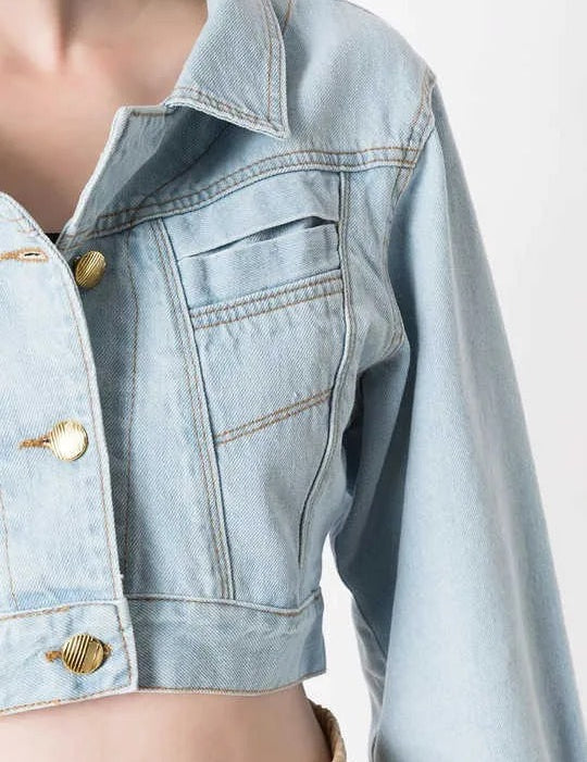 Light blue cropped denim jacket with gold-tone buttons