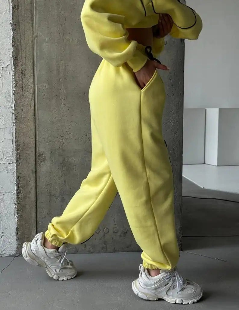Yellow zip-up sweatshirt and jogger set with contrast seams